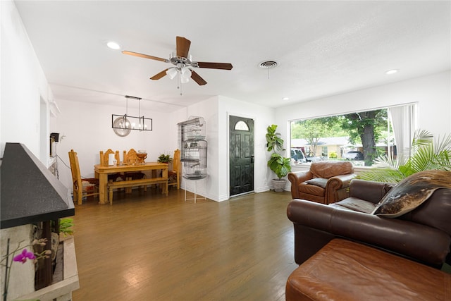 11103 Tascosa St, Dallas, TX 75228 - living room with wood finished floors, a ceiling fan, recessed lighting, a chandelier, and baseboards