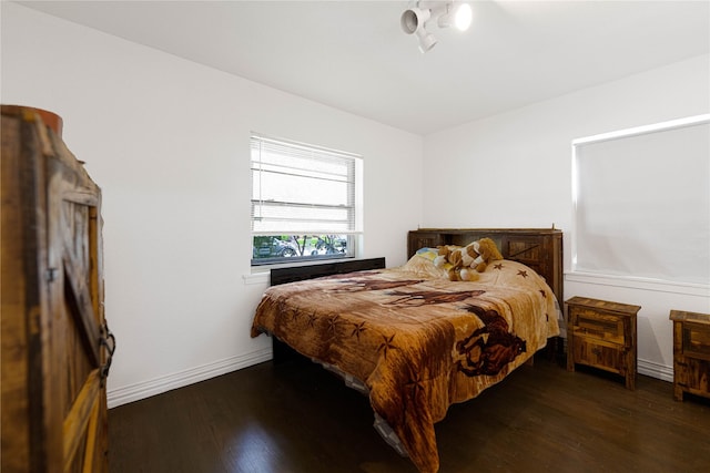 11103 Tascosa St, Dallas, TX 75228 - bedroom featuring wood finished floors and baseboards