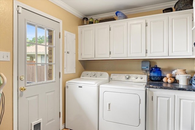 122 County Road 603, Eastland, TX 76448 - laundry area featuring washer and dryer, cabinet space, ornamental molding, and electric panel