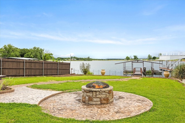 122 County Road 603, Eastland, TX 76448 - view of yard with a fire pit and a water view