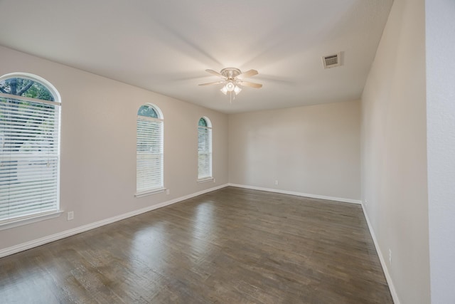 1624 Summer Place Cir, Irving, TX 75062 - unfurnished room with a ceiling fan, dark wood-style flooring, and baseboards