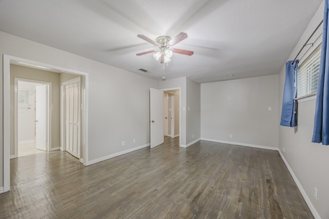1624 Summer Place Cir, Irving, TX 75062 - empty room featuring a ceiling fan, dark wood finished floors, and baseboards