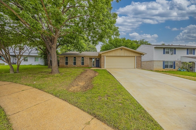 1624 Summer Place Cir, Irving, TX 75062 - view of front of home featuring brick siding, a garage, driveway, and a front yard