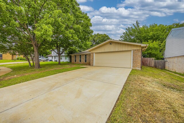 1624 Summer Place Cir, Irving, TX 75062 - single story home featuring brick siding, concrete driveway, and an attached garage