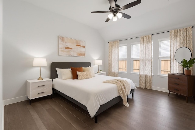 8532 Melrose, The Colony, TX 75056 - bedroom featuring vaulted ceiling, baseboards, dark wood-style flooring, and a ceiling fan