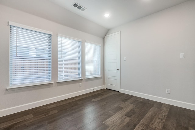 8532 Melrose, The Colony, TX 75056 - unfurnished room with baseboards, dark wood finished floors, vaulted ceiling, and recessed lighting