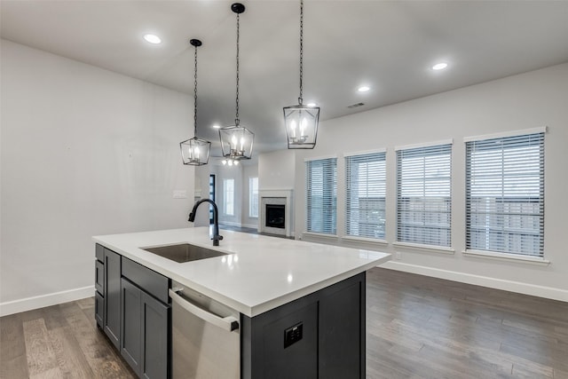 8532 Melrose, The Colony, TX 75056 - kitchen featuring a sink, dishwasher, open floor plan, baseboards, and light countertops