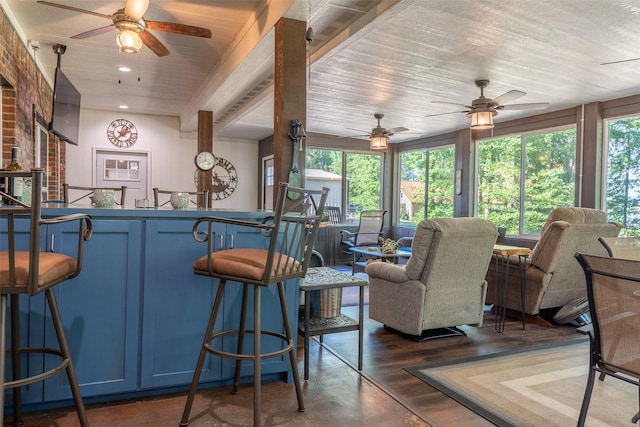 411 Sterling Shores Dr, Scroggins, TX 75480 - living room featuring a ceiling fan, healthy amount of natural light, wooden ceiling, and dark wood finished floors
