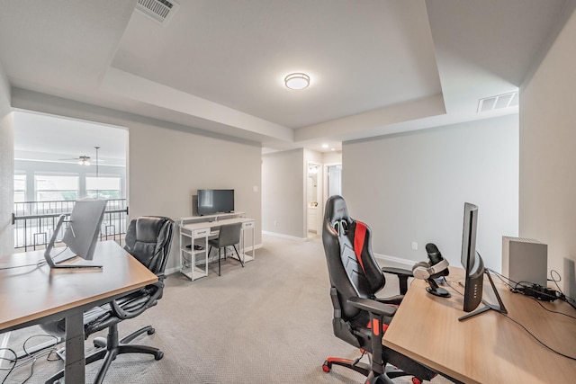 562 Broadleaf Way, Haslet, TX 76052 - office featuring a tray ceiling, baseboards, light carpet, and ceiling fan