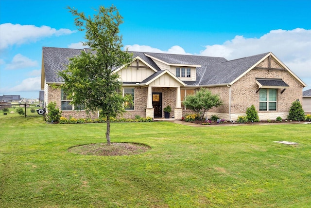 168 Ridgetop Trl, Rhome, TX 76078 - craftsman inspired home featuring brick siding, a shingled roof, and board and batten siding