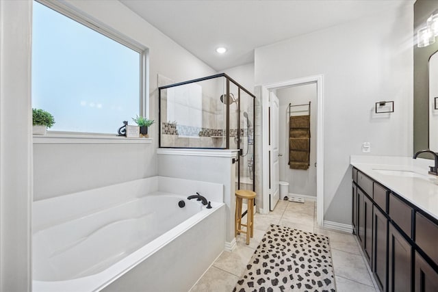 168 Ridgetop Trl, Rhome, TX 76078 - bathroom with a bath, vanity, a shower stall, tile patterned floors, and toilet
