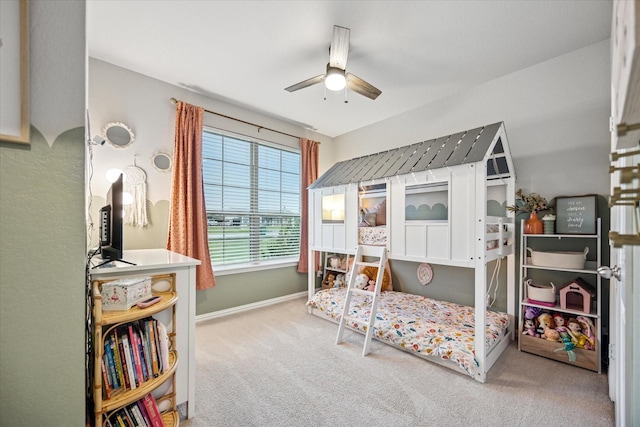 168 Ridgetop Trl, Rhome, TX 76078 - carpeted bedroom with baseboards and a ceiling fan