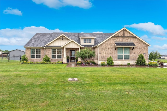 168 Ridgetop Trl, Rhome, TX 76078 - view of front of home with brick siding, board and batten siding, and a shingled roof