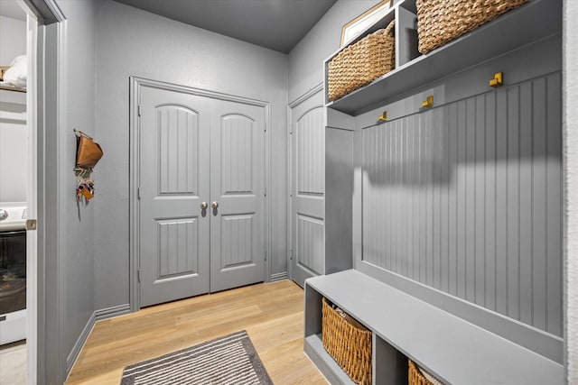 168 Ridgetop Trl, Rhome, TX 76078 - mudroom with light wood finished floors and baseboards