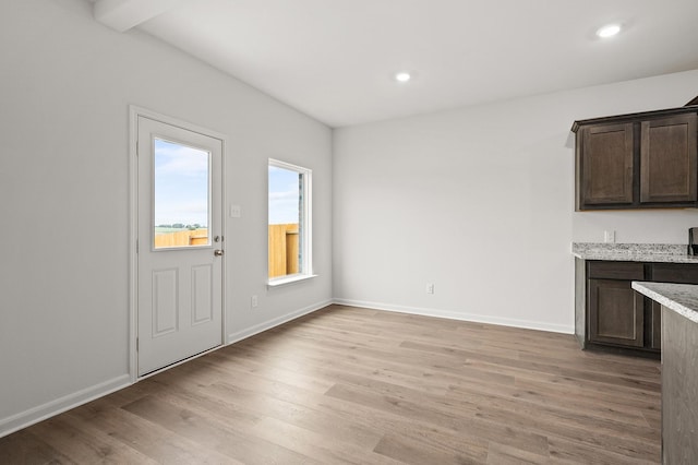 426 Gib Woodall Dr, Venus, TX 76084 - unfurnished dining area featuring light wood finished floors, baseboards, and recessed lighting