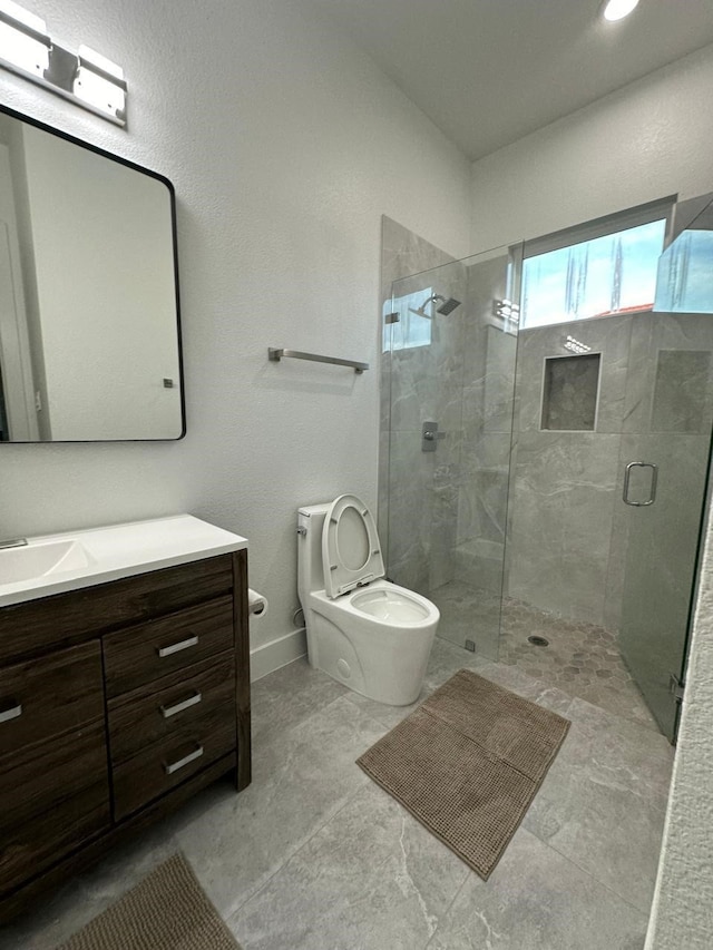 4715 Glavica Dr, Irving, TX 75062 - bathroom with toilet, vanity, and a stall shower