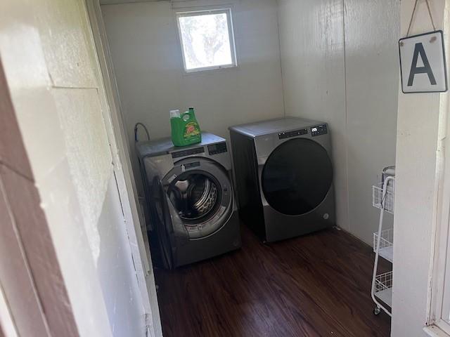 214 Hemphill St, Hico, TX 76457 - laundry room featuring washer and clothes dryer and dark wood finished floors