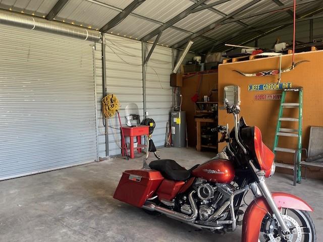 214 Hemphill St, Hico, TX 76457 - garage featuring water heater