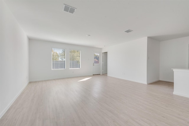 2037 Welsh Ln, Aubrey, TX 76227 - spare room featuring light wood-style floors and baseboards