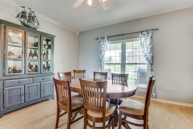 3820 Blossom Dr, Sachse, TX 75048 - dining space featuring light wood-style flooring, ceiling fan, ornamental molding, and baseboards