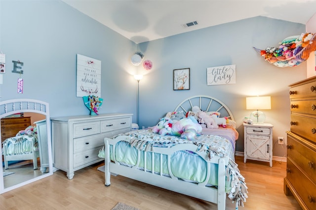 3820 Blossom Dr, Sachse, TX 75048 - bedroom featuring light wood-style flooring and baseboards
