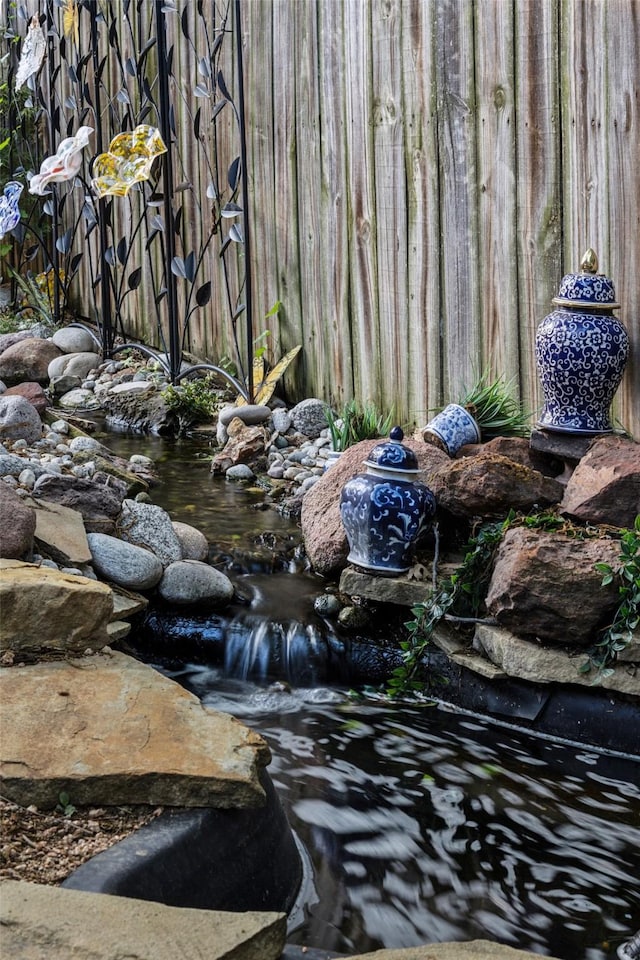 9705 Ash Creek Dr, Dallas, TX 75228 - exterior view of a small pond