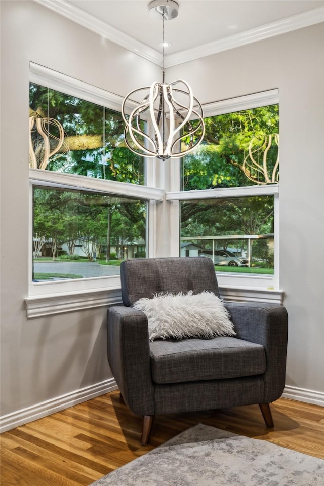 9705 Ash Creek Dr, Dallas, TX 75228 - sitting room with a chandelier, ornamental molding, wood finished floors, and baseboards