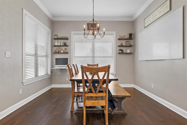 41 N Shore Cir, Waco, TX 76708 - dining room featuring a chandelier, dark wood-style floors, ornamental molding, and baseboards