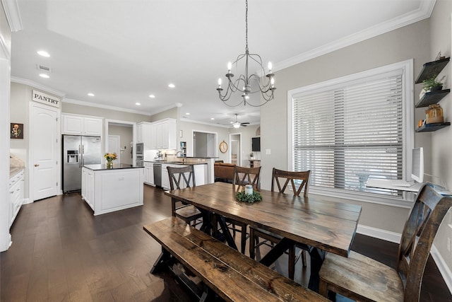 41 N Shore Cir, Waco, TX 76708 - dining room featuring recessed lighting, a chandelier, dark wood-type flooring, ornamental molding, and baseboards