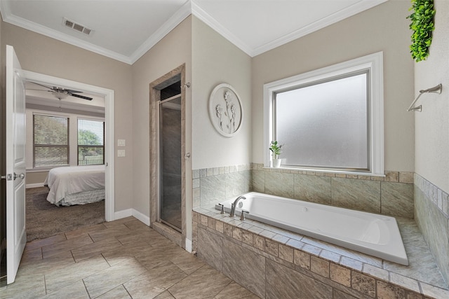 41 N Shore Cir, Waco, TX 76708 - ensuite bathroom with a garden tub, a stall shower, ornamental molding, ceiling fan, and baseboards