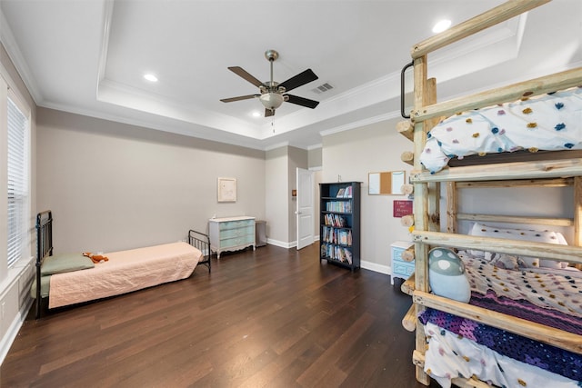 41 N Shore Cir, Waco, TX 76708 - bedroom featuring wood finished floors, a tray ceiling, crown molding, recessed lighting, and baseboards