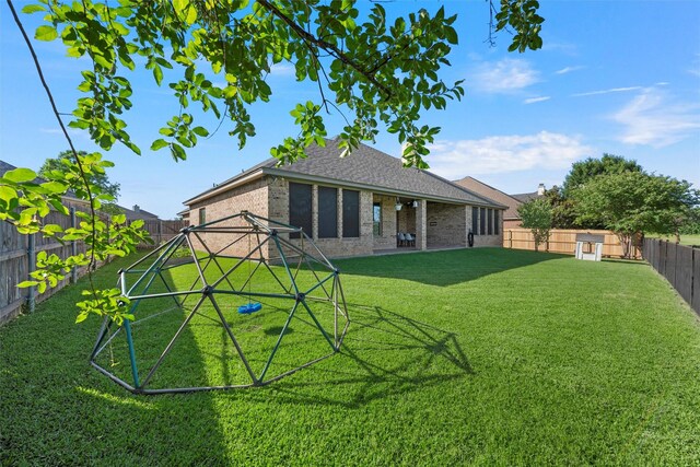 41 N Shore Cir, Waco, TX 76708 - rear view of property featuring brick siding and roof with shingles
