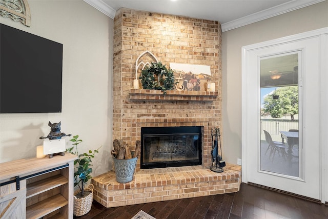 41 N Shore Cir, Waco, TX 76708 - living room with ornamental molding, wood finished floors, and a brick fireplace