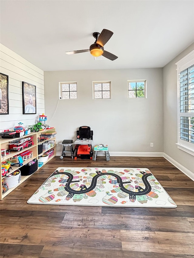 2219 Wellington Ln, Corinth, TX 76210 - game room featuring plenty of natural light, ceiling fan, wood finished floors, and baseboards