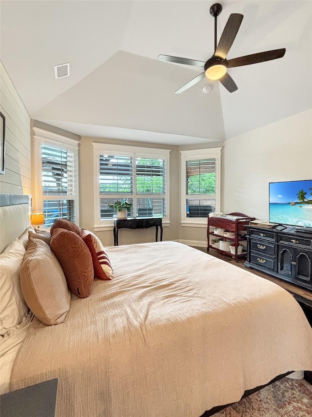 2219 Wellington Ln, Corinth, TX 76210 - bedroom featuring lofted ceiling, multiple windows, and ceiling fan