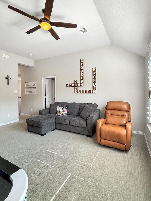2219 Wellington Ln, Corinth, TX 76210 - living area with carpet floors, ceiling fan, baseboards, and lofted ceiling