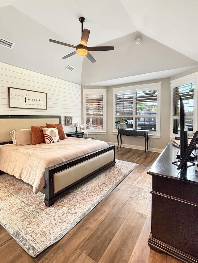 2219 Wellington Ln, Corinth, TX 76210 - bedroom featuring vaulted ceiling, wood finished floors, ceiling fan, and baseboards