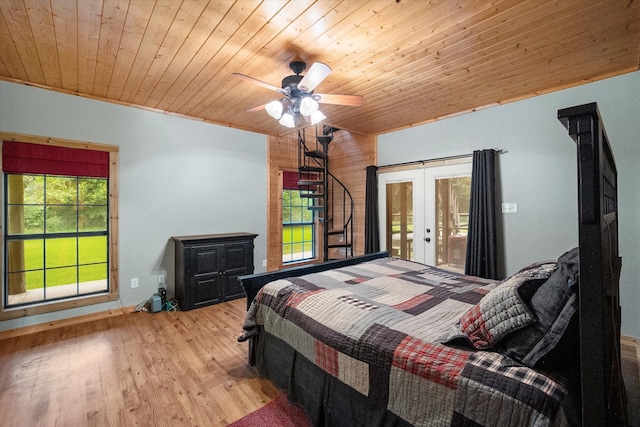 108 Fcr 868, Teague, TX 75860 - bedroom with french doors, wood ceiling, access to exterior, wood finished floors, and a ceiling fan