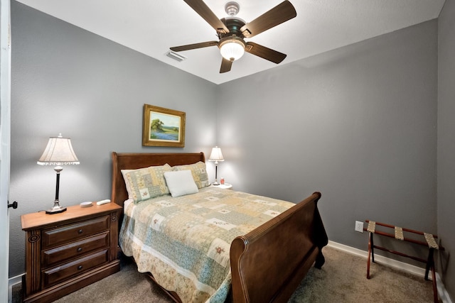 108 Fcr 868, Teague, TX 75860 - bedroom with dark carpet, baseboards, and a ceiling fan