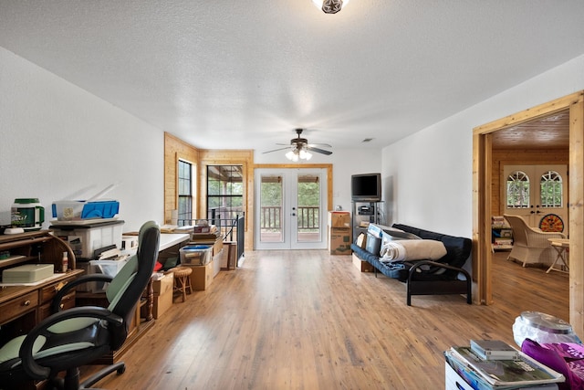 108 Fcr 868, Teague, TX 75860 - home office with wood finished floors, french doors, plenty of natural light, a textured ceiling, and ceiling fan