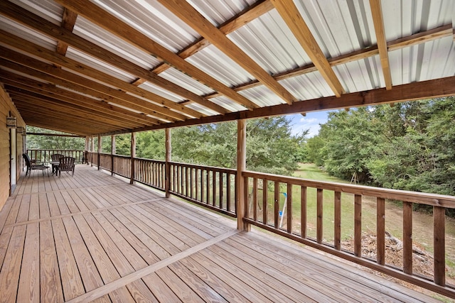 108 Fcr 868, Teague, TX 75860 - deck featuring view of wooded area and outdoor dining space