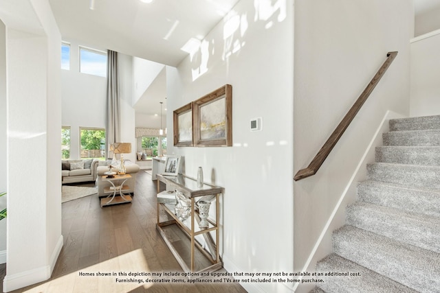 3416 Running Stream Way, Melissa, TX 75454 - stairs with a towering ceiling, wood finished floors, and baseboards