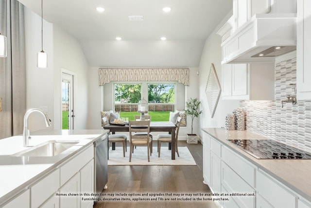 3416 Running Stream Way, Melissa, TX 75454 - kitchen featuring a sink, black electric cooktop, dark wood-type flooring, tasteful backsplash, and lofted ceiling
