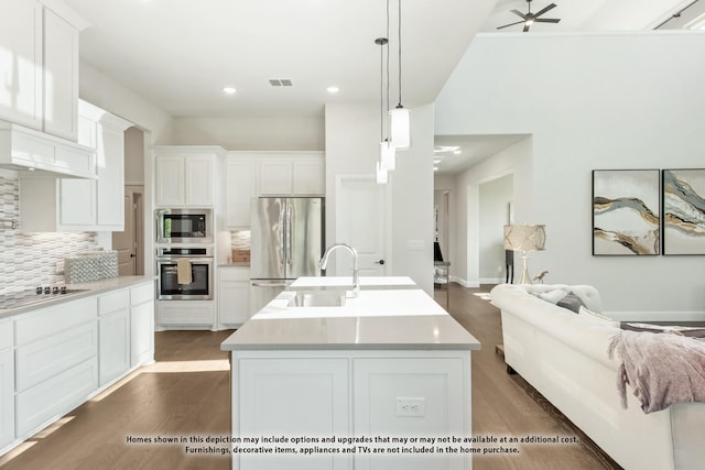 3416 Running Stream Way, Melissa, TX 75454 - kitchen featuring stainless steel appliances, open floor plan, backsplash, dark wood-type flooring, and recessed lighting