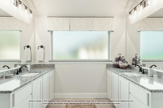 3416 Running Stream Way, Melissa, TX 75454 - bathroom featuring two vanities and baseboards