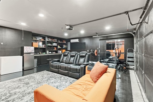 110 Harmon Cir, Blue Ridge, TX 75424 - home theater room featuring a garage, a wall unit AC, and recessed lighting