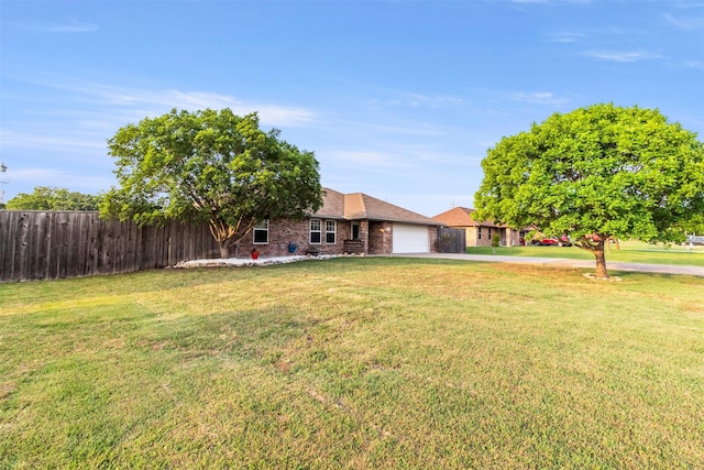 110 Harmon Cir, Blue Ridge, TX 75424 - view of front facade featuring an attached garage, driveway, and brick siding