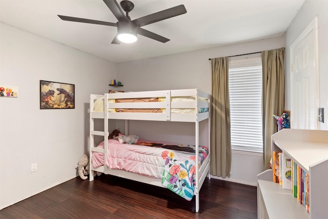 110 Harmon Cir, Blue Ridge, TX 75424 - bedroom featuring dark wood finished floors, ceiling fan, and baseboards