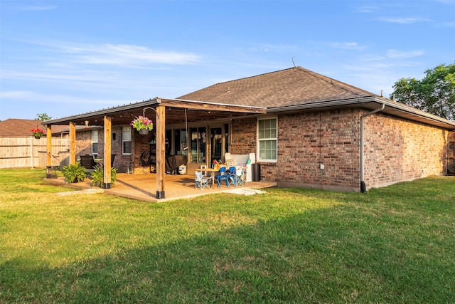110 Harmon Cir, Blue Ridge, TX 75424 - rear view of property with brick siding, a patio, and roof with shingles