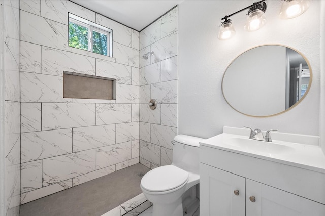 1312 E Collin, Corsicana, TX 75110 - full bath featuring vanity, a tile shower, toilet, and marble finish floors